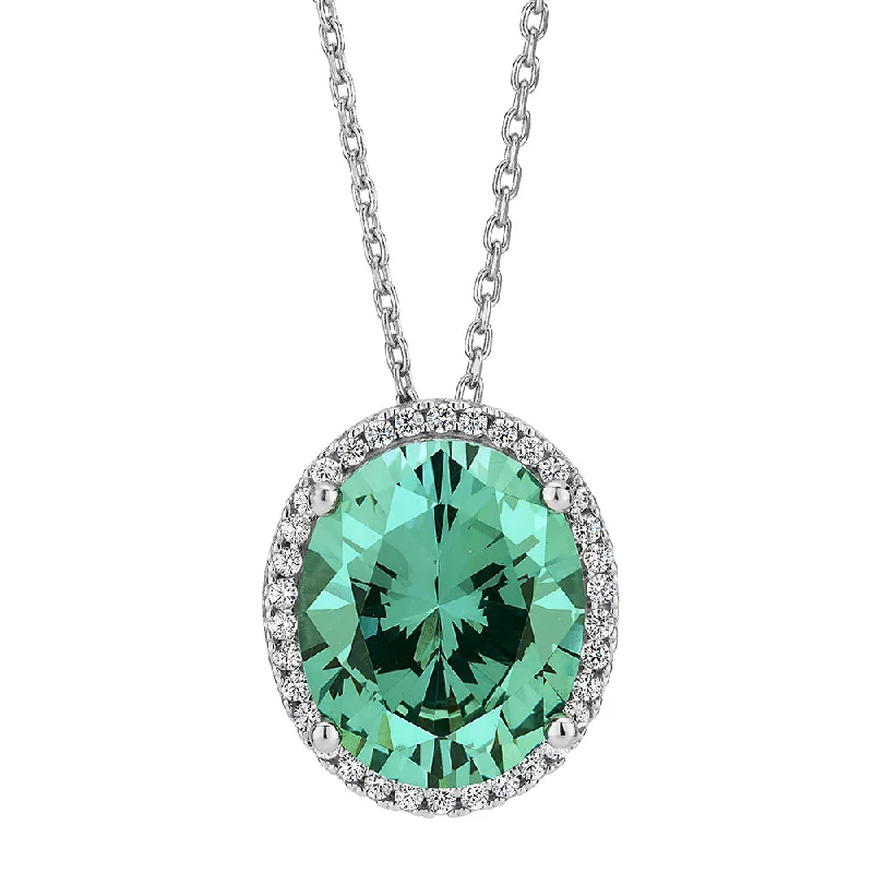 twisted pendant necklace-Halo necklace with ocean green simulant and 0.27 carats* of diamond simulants in sterling silver