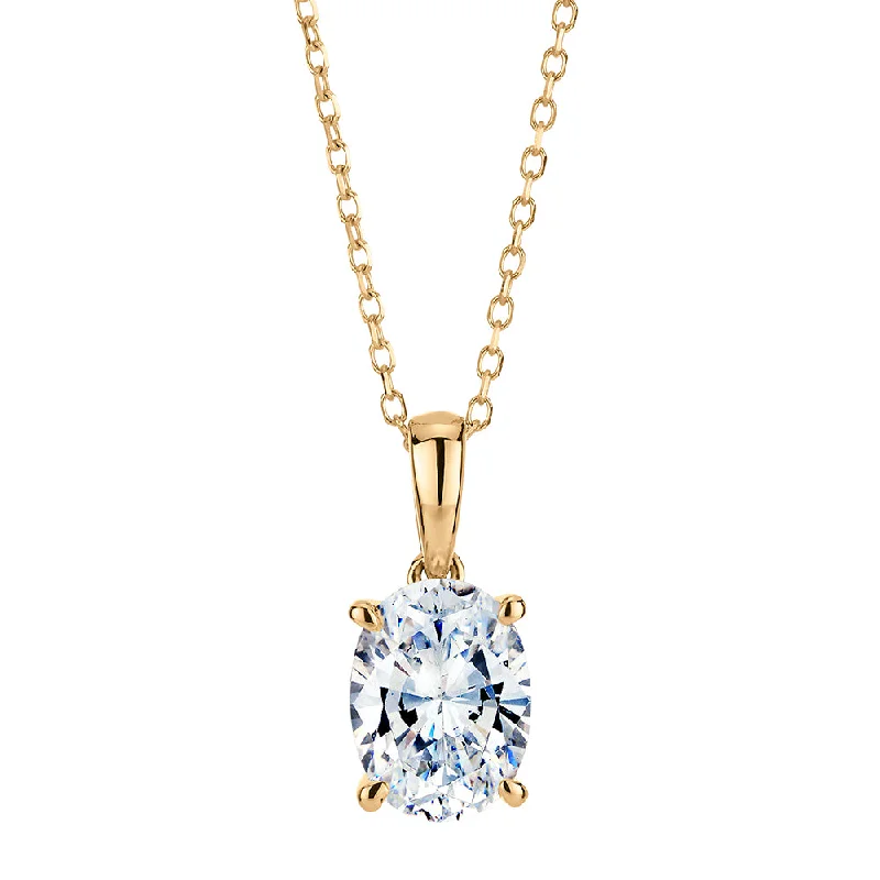 weathered gold necklace-Oval and Round Brilliant solitaire pendant with 1.25 carats* of diamond simulants in 10 carat yellow gold